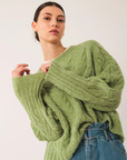 Indi & Cold Cable Knit Jumper in Matcha Green