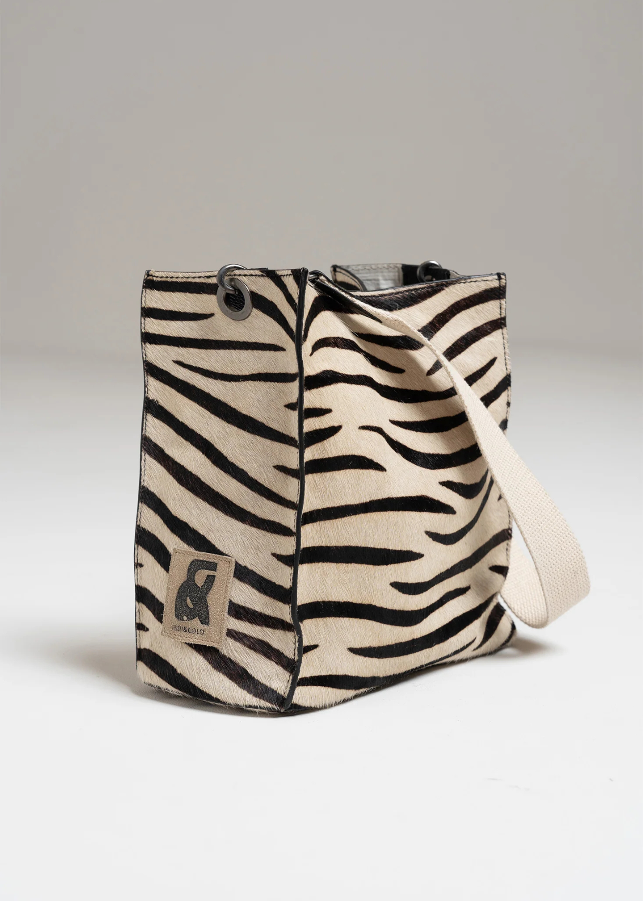 Indi & Cold Leather Bucket Tote Bag, Zebra Print
