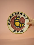 Tatiana Alida hand-painted Croissant Run breakfast plate