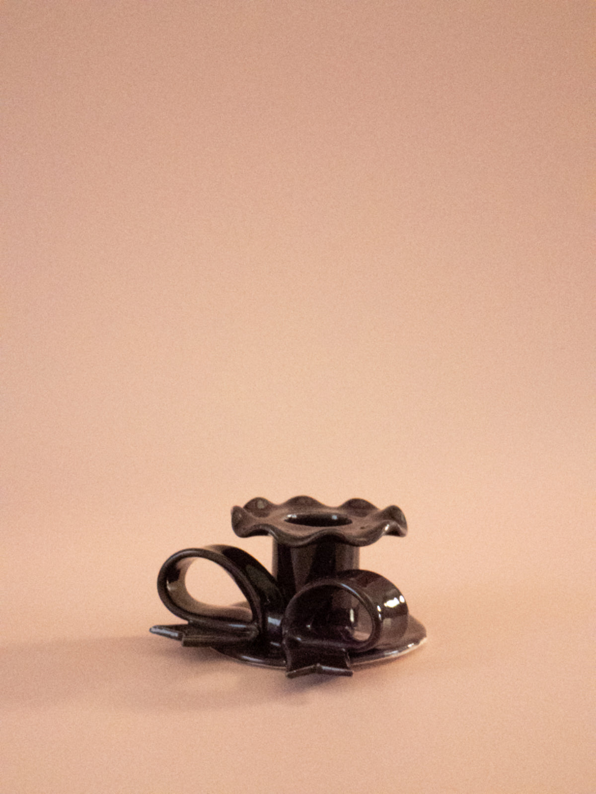 Superfluities fig bow candlestick, alternate view