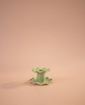Superfluities single frill ceramic candlestick in pistachio green